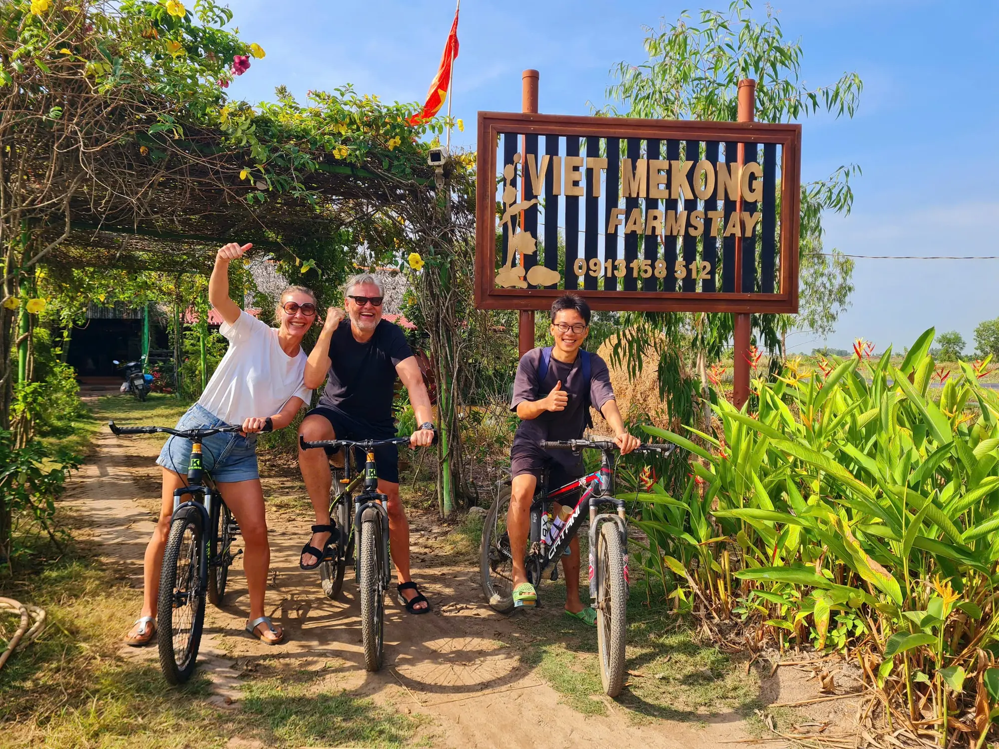 Guests cycling slowly through the farmstay landscape