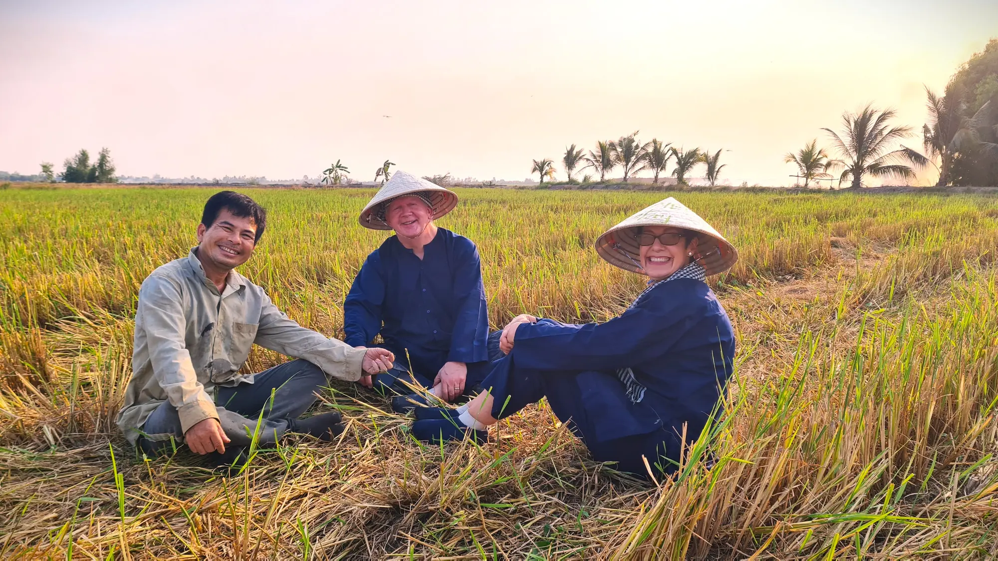 Guests joining a seasonal rice activity with local hosts