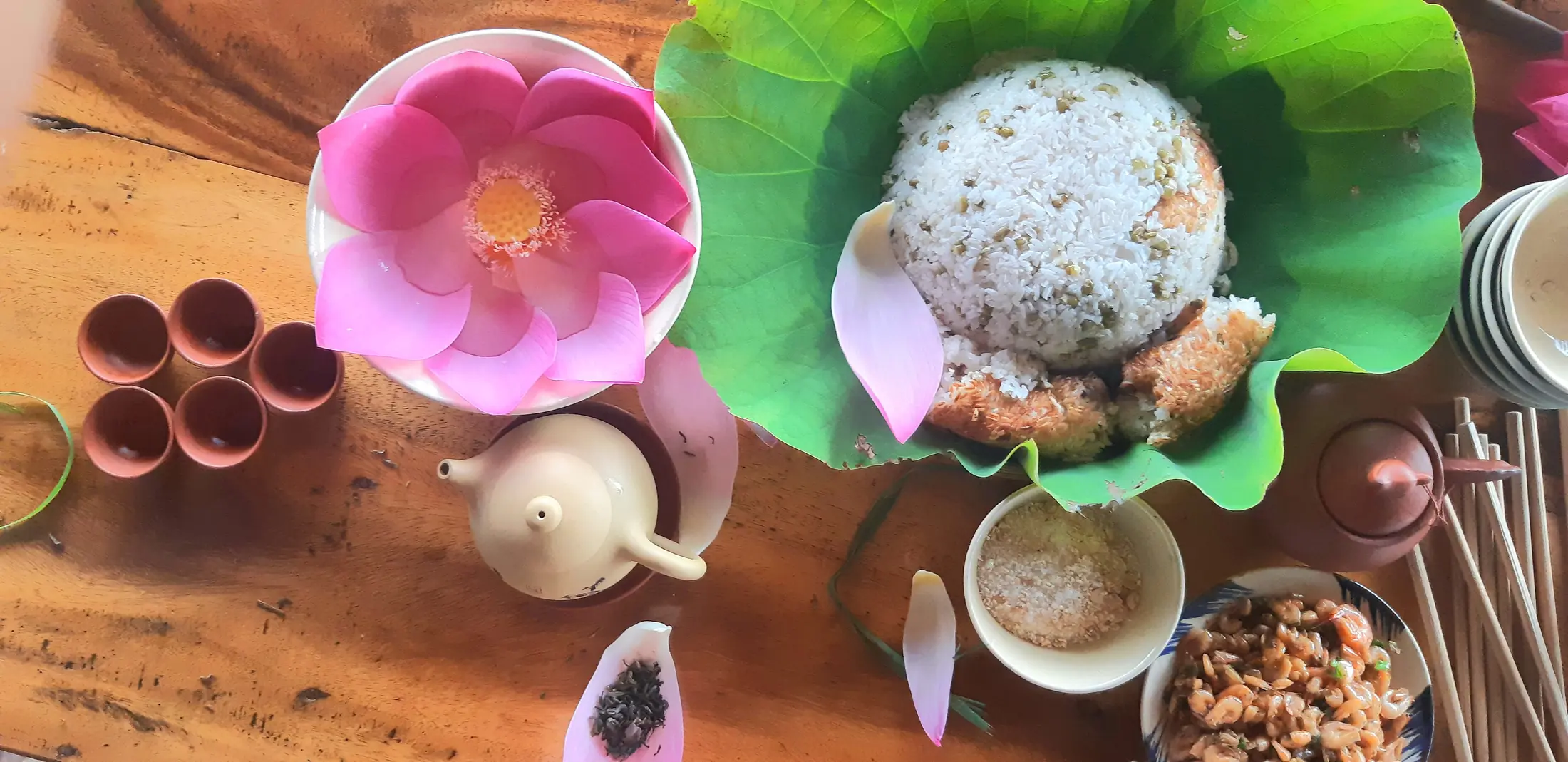 Rice breakfast presented on a lotus leaf